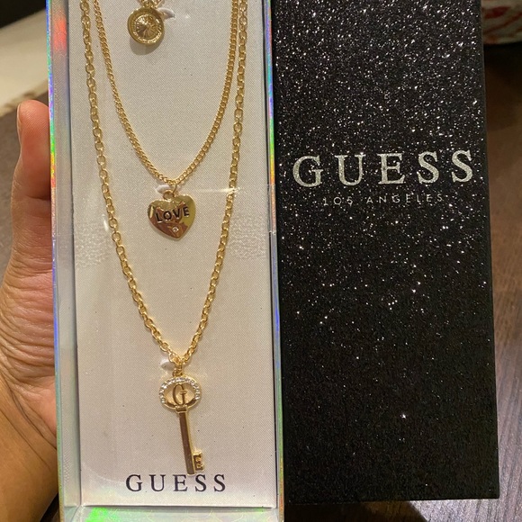 4 pc of necklaces and earrings set GUESS - Picture 2 of 3
